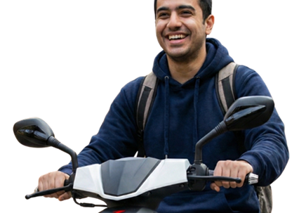 A person smiles while riding a white scooter with a backpack.